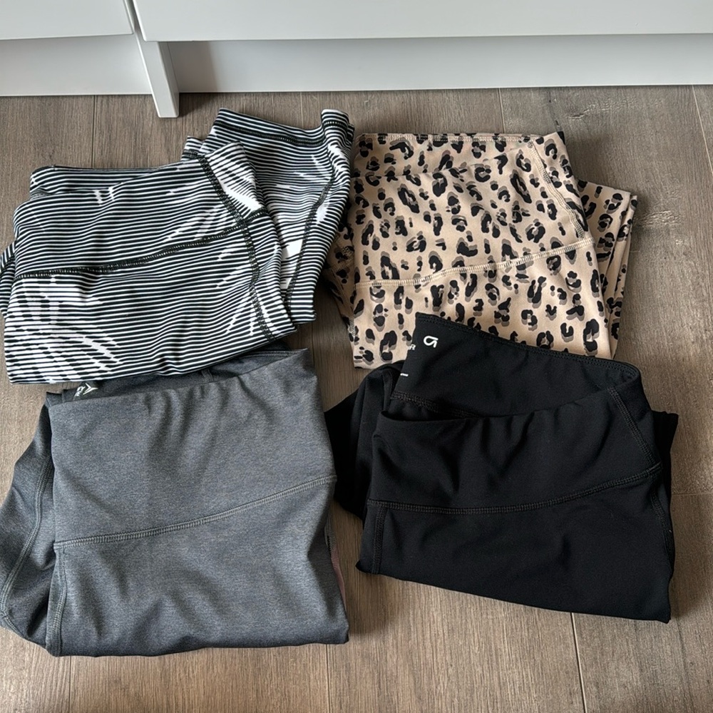 Set of 4 leggings. The 3 patterned pairs are in like new condition— read below